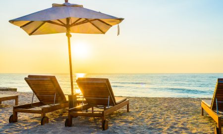 Beach Chair and Umbrella at Sunrise